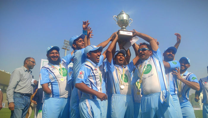 Players seen lifitng a trophy in this undated photo.— ICRC.org/File