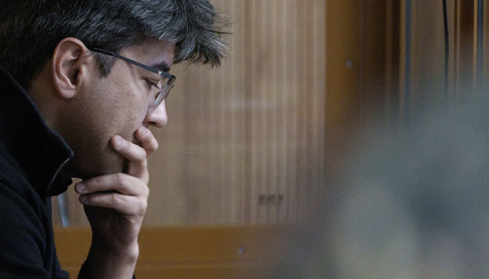 Kazakhstans former Economy Minister Kuandyk Bishimbayev is seen behind a glass wall of an enclosure for defendants during a court hearing in Astana, Kazakhstan, May 13, 2024. — Reuters