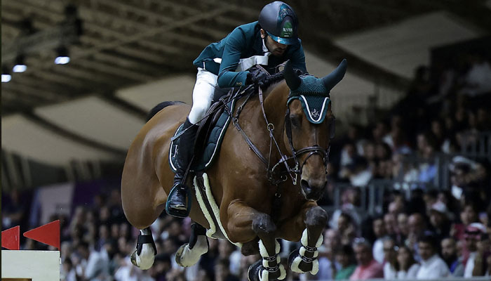 Saudi Arabias Khaled Almobty riding Jaguar King WD in action during the Longines world cup final.— Reuters/file