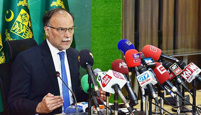 Federal Minister for Planning, Development and Special Initiatives, Prof. Ahsan Iqbal addresses the Press Conference. — APP/File