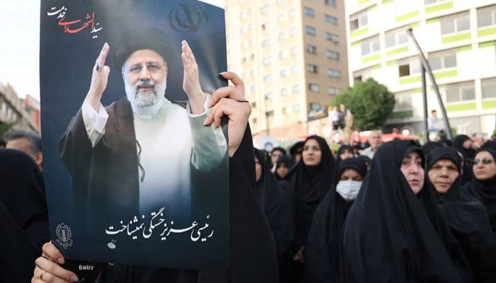 People gather to mourn for the death of the late Irans President Ebrahim Raisi, in Tehran, Iran, May 20, 2024. — Reuters