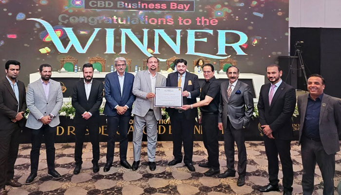 Participants pose for a group photo at the CBD Punjab Grand Open Auction for CBD Business Bay 2 on May 23, 2024. — Facebook/Central Business District Punjab