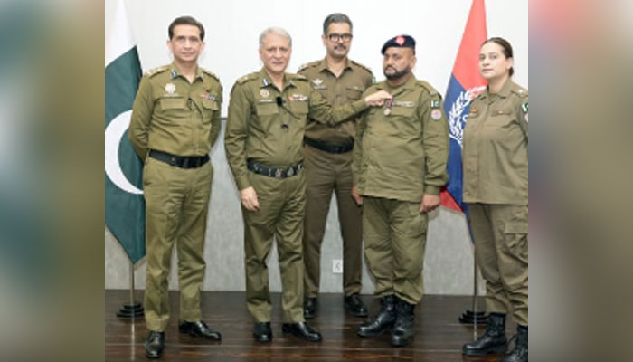 In this image, IG Punjab Dr Usman Anwer awards silver medals to Ghazi of the Rawalpindi region on May 23, 2024. — Facebook/Punjab Police Pakistan