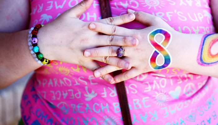 An obese teenage child is seen in this photo.— Pexels