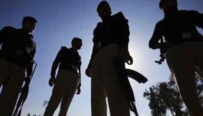 A representational image of police personnel standing guard at an undisclosed location. — AFP/File