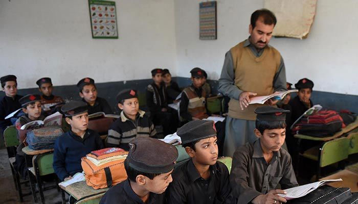 A representational image of students in a classroom at a school in Khyber Pakhtunkhwa. — AFP/File