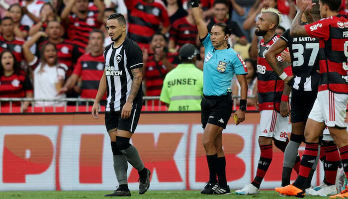 Botafogos Rafael is shown a red card by referee Edina Alves Batista on April 30, 2023.  — REUTERS