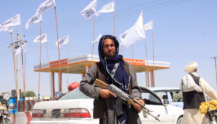 A Taliban fighter looks on as he stands at the city of Ghazni, Afghanistan August 14, 2021. — Reuters