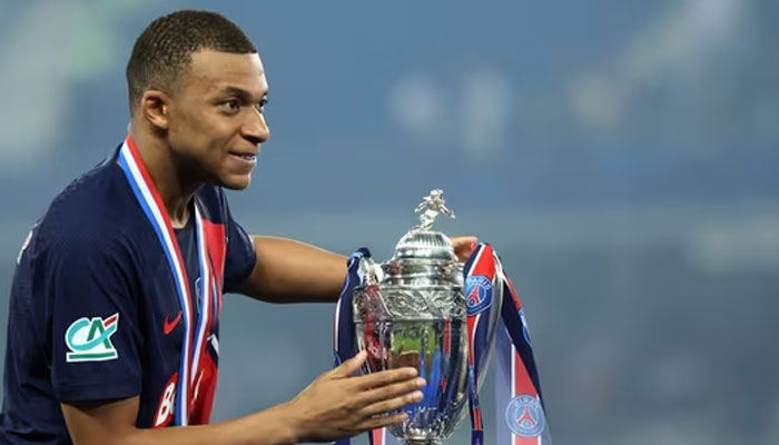 PSG Kylian Mbappe celebrates with the trophy after winning the Coupe de France.— Reuters/file