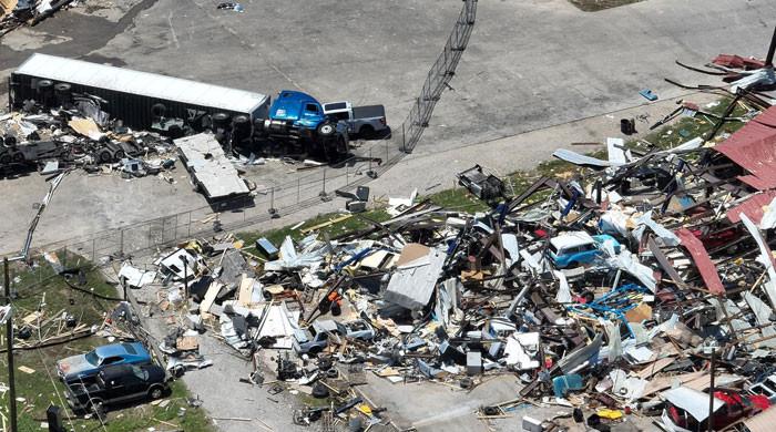 US storms kill at least 21 across four states