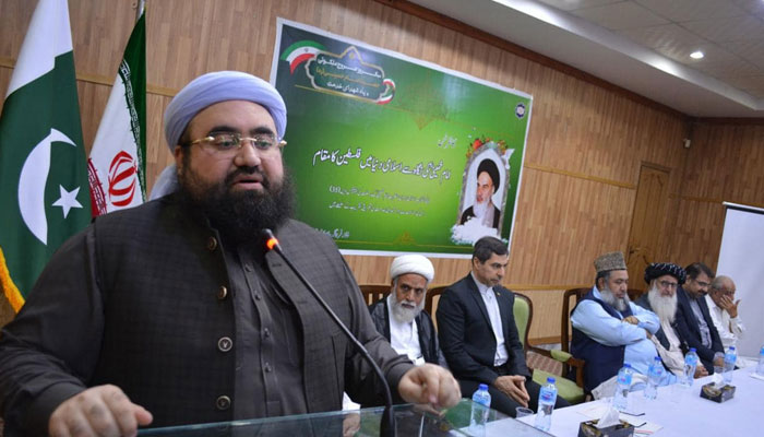 KP Minister for Auqaf, Haj and Religious Affairs, Muhammad Adnan Qadri as a chief guest addresses a function arranged to mark the 35th death anniversary of Imam Khomeini on June 4, 2024. — Facebook/Muhammad Adnan Qadri