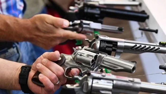 A representational image shows a variety of handguns. — AFP/File