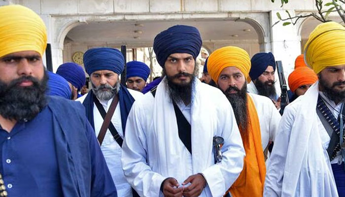 Amritpal Singh (center), 31, seen in this undated image.— Reuters/file