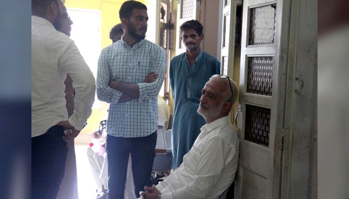 Federal Investigation Agency (FIA) officials are escorting arrested Social activist and entrepreneur Sarim Burney during a case hearing of involvement with human trafficking, at City Court premises in Karachi on June 6, 2024. — PPI