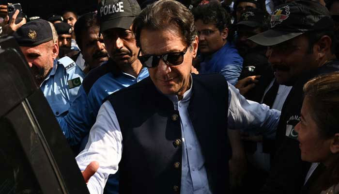 PTI founder and former prime minister Imran Khan arrives at an Islamabad court for a hearing in this undated image. — AFP/File