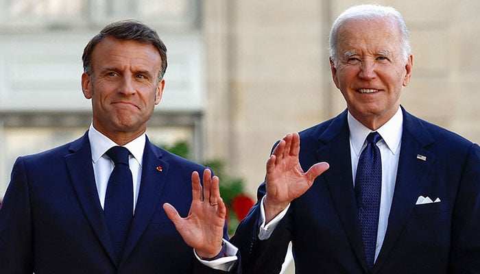 French President Emmanuel Macron and US President Joe Biden gesture, ahead of a state dinner at the Elysee Palace in Paris, France on June 8, 2024. — Reuters