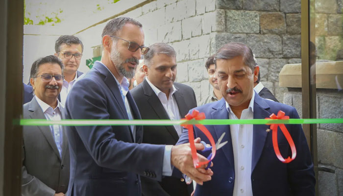 Prince Rahim Aga Khan (Left) cuts a ribbon to inaugurate the new Software Technology Park in Nasirabad on June 8, 2024. — AKDN Website