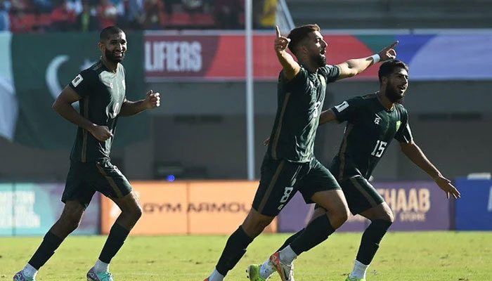 Pakistans players celebrate after scoring a goal during the 2026 FIFA World Cup qualifier football match between Pakistan and Tajikistan at the Jinnah Sports stadium in Islamabad on November 21, 2023. —AFP/File