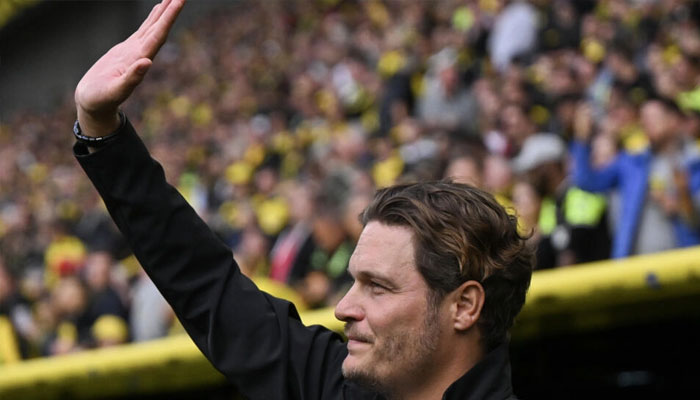 Dertmund manager Edin Terzic seen waving in this undated image.— AFP/file