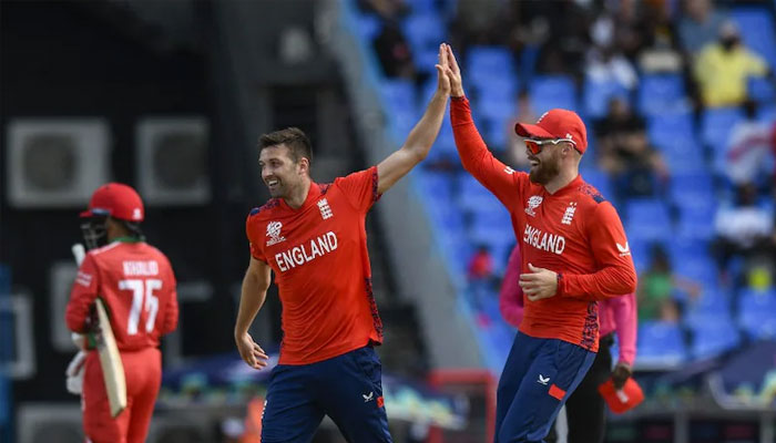 English players celebrating after taking a wicket.— AFP/file
