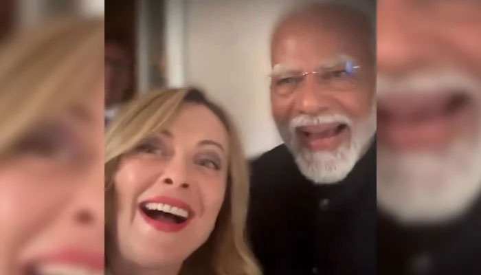 Italys PM Giorgia Meloni and Indian PM Narendra Modi gesture during a video posted by Italys premier on June 15, 2024. — Screengrab via X/@GiorgiaMeloni