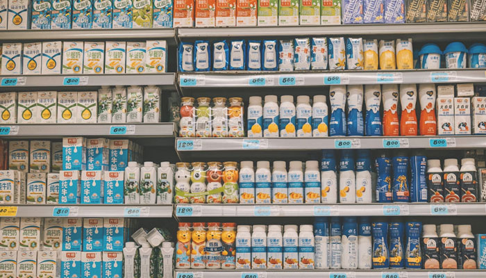 In this representational image, Milk cartons are placed in a supermarket. — Unsplash/File