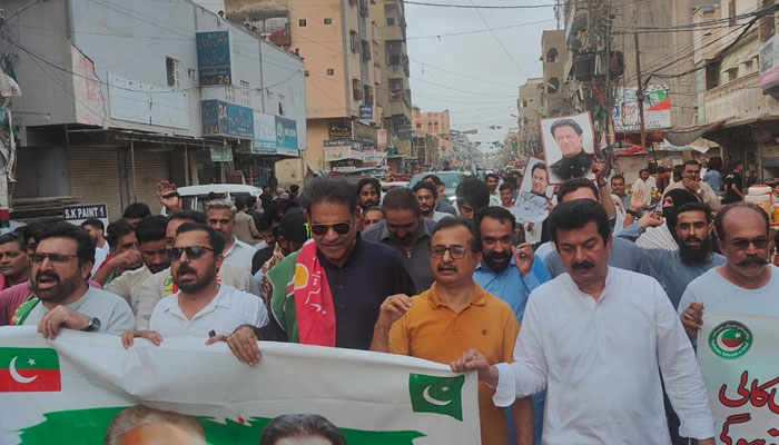 Sindh PTI President Haleem Adil Sheikh leads a rally in Karachi on June 21, 2024. — Facebook/haleemadilsheikh1