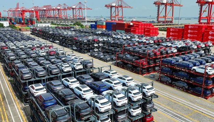 Chinese electric car manufacturer BYDs electric cars wait to be loaded onto a ship at a port in eastern Jiangsu province. — AFP/File
