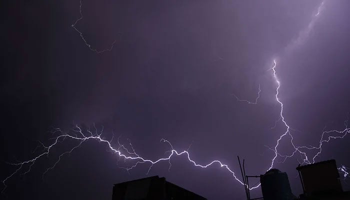A stunning view of lightning during a thunderstorm before heavy rain late at night in Rawalpindi on June 15, 2023. — Online