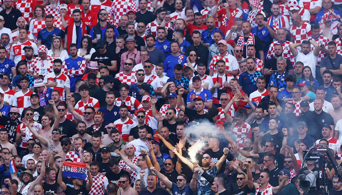 Croatia fans let off a flare in the stands during Euro 2024 Group B match between Croatia and Albania at Hamburg Volksparkstadion in Germany on June 19, 2024. — Reuters