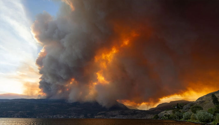 The McDougall Creek wildfire burns in the hills of West Kelowna, British Columbia, Canada, on August 17, 2023. — AFP
