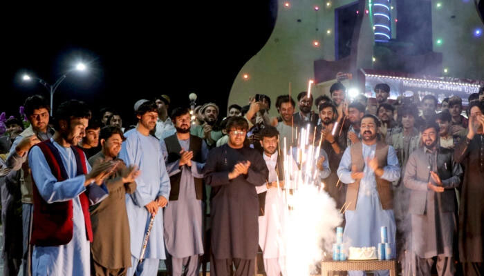 Afghan fans light firecrackers in Khost on June 23, 2024 to celebrate Afghanistans win against Australia at their ICC mens Twenty20 World Cup 2024 Super Eight cricket match.— AFP