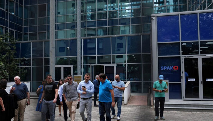Supporters of jailed ethnic Greek politician Fredi Beleri are seen in front of the appeal court in Tirana after the court upheld a lower verdict on election fraud in Tirana, Albania, on June 25, 2024. — Reuters
