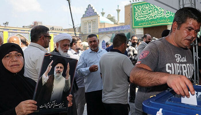 An Iranian man votes at a polling station in a snap presidential election to choose a successor to Ebrahim Raisi following his death in a helicopter crash, in Tehran, Iran June 28, 2024. — Reuters
