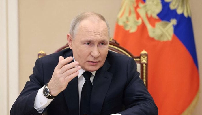 Russian President Vladimir Putin takes part in the opening ceremony of the Year of Teacher and Mentor, via video link in Moscow, Russia March 2, 2023. — Reuters