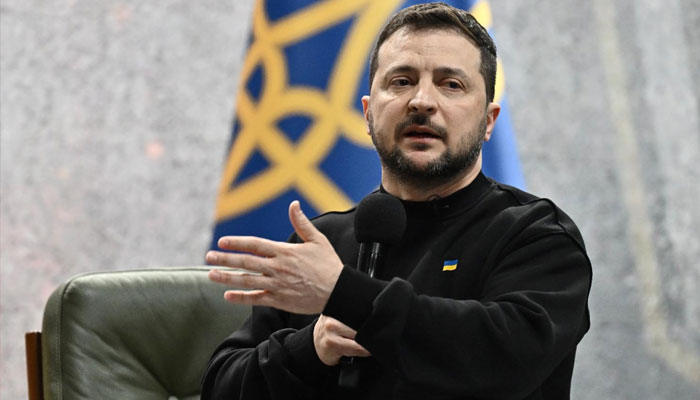 Ukrainian President Volodymyr Zelensky gestures as he gives a press conference in Kyiv on February 24, 2023 on the first anniversary of the Russian invasion of Ukraine. —AFP