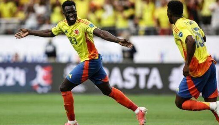 Davinson Sanchez celebrates after scoring Colombias second goal in a 3-0 win over Costa Rica on June 28, 2024. — AFP