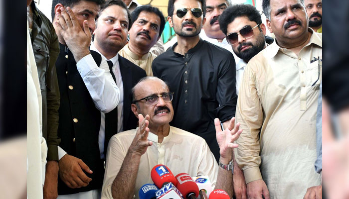 Opposition Leader in Punjab Assembly, Malik Ahmed Khan Bhachar along with others addresses media persons during a press conference after a meeting of PTI MPAs at Punjab Assembly premises in Lahore on, July 3, 2024. — PPI