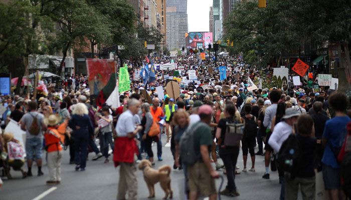 People rally to end fossil fuels ahead of the 78th United Nations General Assembly and Climate Ambition Summit in New York on September 17, 2023. — AFP