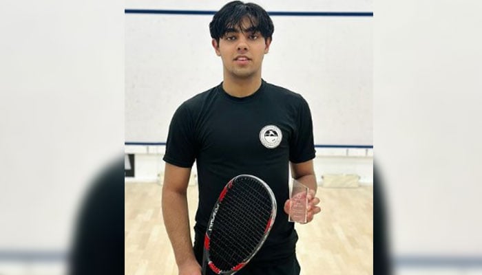 Pakistans squash player Ashab Irfan poses for a photo in a squash court in this undated image. — Instagram/ashab.irfan/File