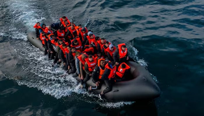 In this drone view an inflatable dinghy carrying migrants makes its way towards England in the English Channel, Britain on May 4, 2024. — Reuters