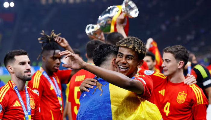 Spains Soccer Player  Lamine Yamal celebrates with teammates after winning Euro 2024 on July 14, 2024. — Reuters