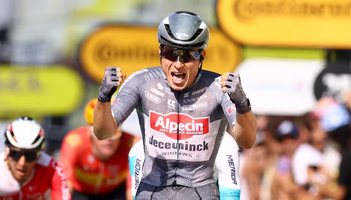 Alpecin - Deceunincks Jasper Philipsen celebrates winning stage 16 on  July 16, 2024 — Reuters