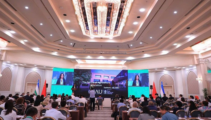 A participant delivers a speech at the 9th Annual Conference of the “Silk Road Agricultural Education and Research Innovation Alliance.” on July 13, 2024. — Facebook/International Agriculture University - IAU