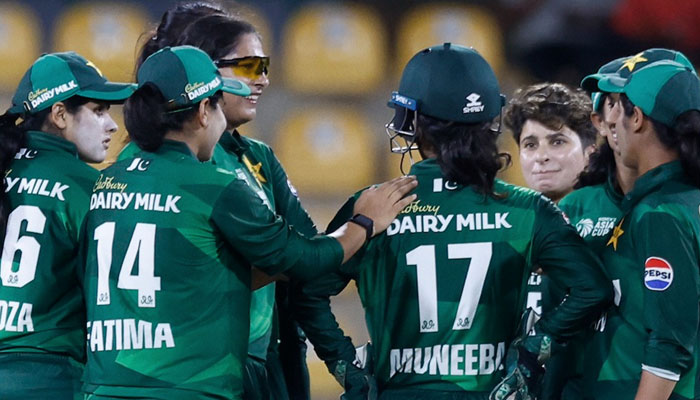 Pakistani women cricketers seen celebrating after taking a wicket in this image. — Facebook @Cricinfo/file