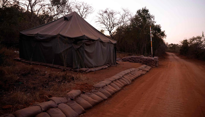 A general view of a tent at the entrance to a farm where the South African Police Services detained ninety five Libyan nationals for receiving training at what authorities suspect to be a secret military camp in White River, Mpumalanga province on July 26, 2024. — AFP