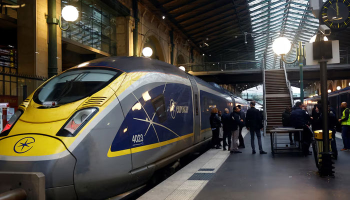 People stand on a platform at the Eurostar terminal at Gare du Nord train station in Paris, France on December 21, 2023. — Reuters