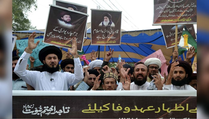 Members of Tehreek-e-Labbaik Pakistan (TLP) hold a protest demonstration against the Supreme Court Pakistan, near the Peshawar press club on July 28, 2024. — PPI
