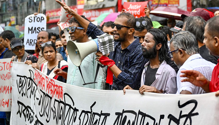 Protestors rally to demand justice for victims arrested and killed in the recent countrywide violence in Dhaka on August 1, 2024. — AFP