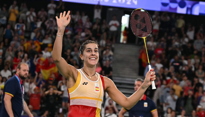 Spains Carolina Marin celebrates winning against Japans Aya Ohori in their womens singles badminton quarter-final match during the Paris 2024 Olympic Games in Paris on August 3, 2024. — AFP